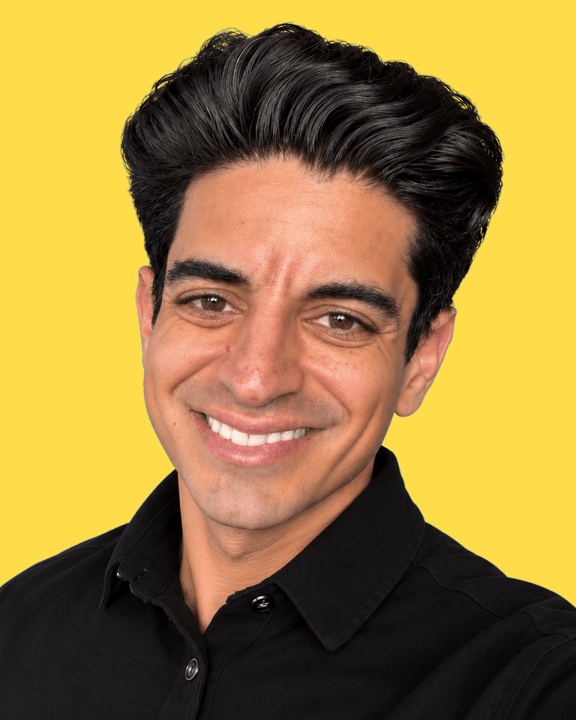 Basim Mousilli, smiling in a black shirt